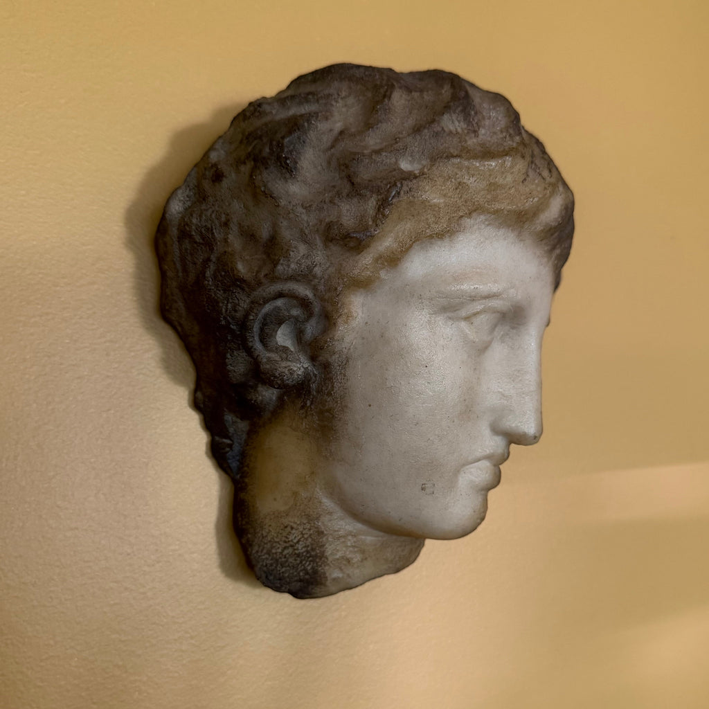Hanging Face Sculpture