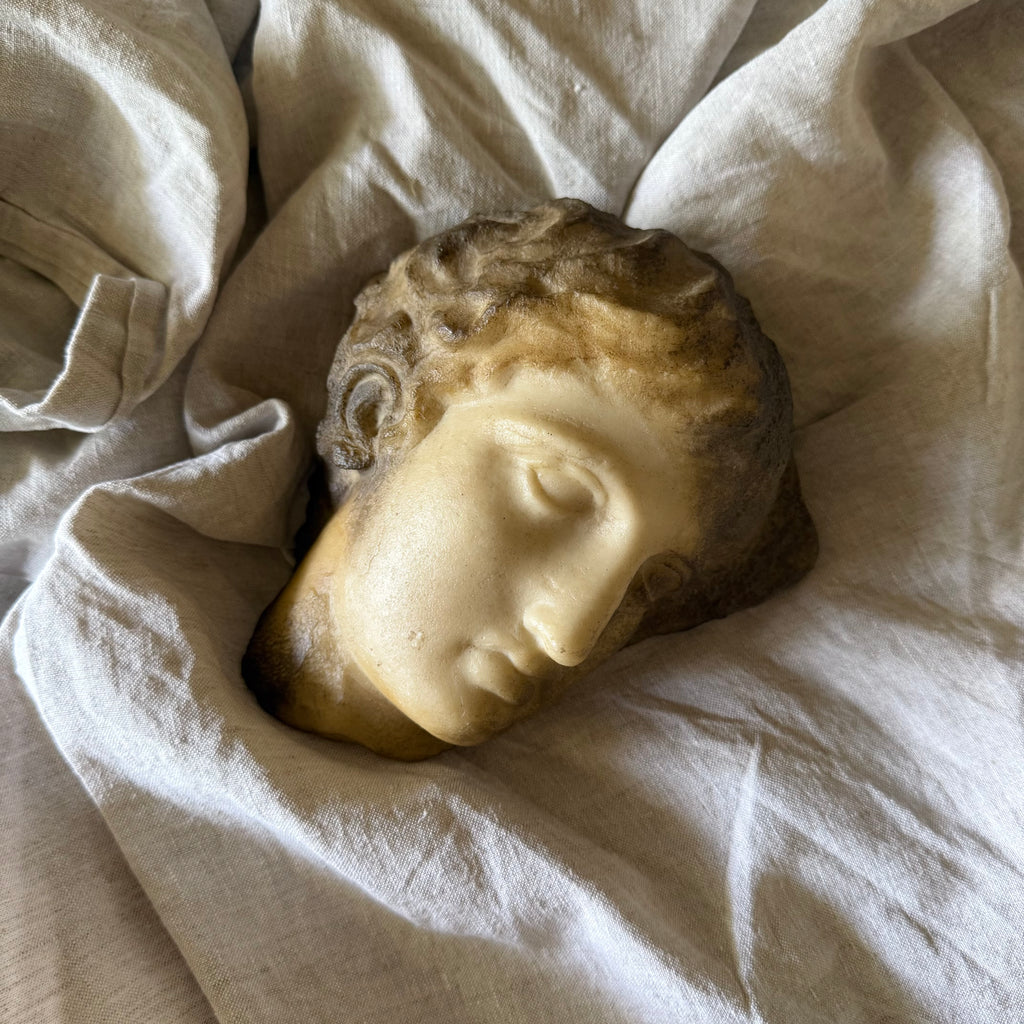 Hanging Face Sculpture